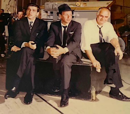 Frank Jr., Frank Sr., Sonny Burke, photo from book Sinatra 100, listening to a playback at a session in the  mid 1960s.
